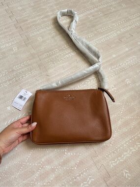 kate spade tan pebble leather crossbody with gold logo